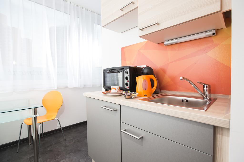 Design Sleepy Cologne Aparthotel Szoba fotó