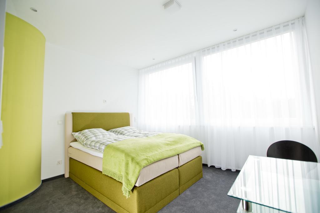 Design Sleepy Cologne Aparthotel Szoba fotó