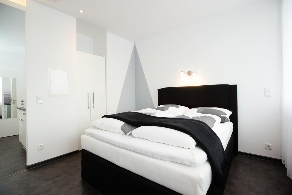 Design Sleepy Cologne Aparthotel Szoba fotó